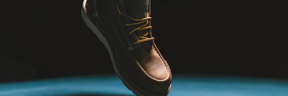 Origin ChatGPT ad — Handcrafted American Boots Built for Life.