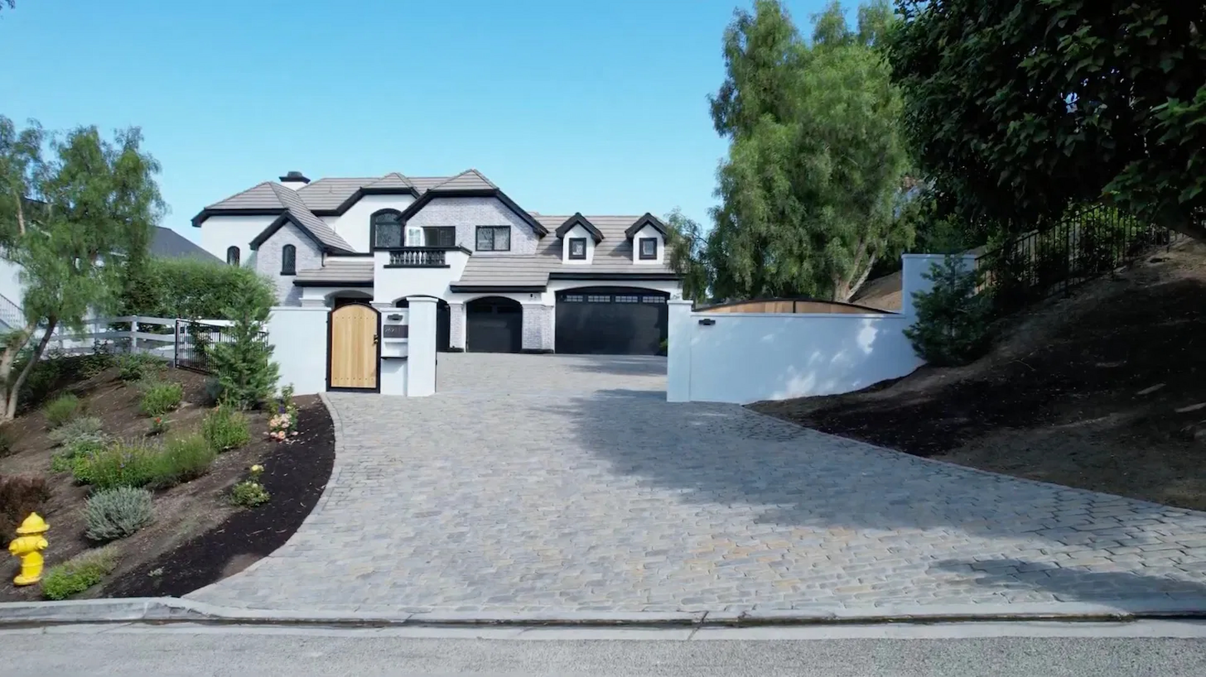 Watkins Real Estate Holdings, Inc. ChatGPT ad — OC Concrete, Pavers, Turf & Walls in Garage Door Replacement & Repair Services