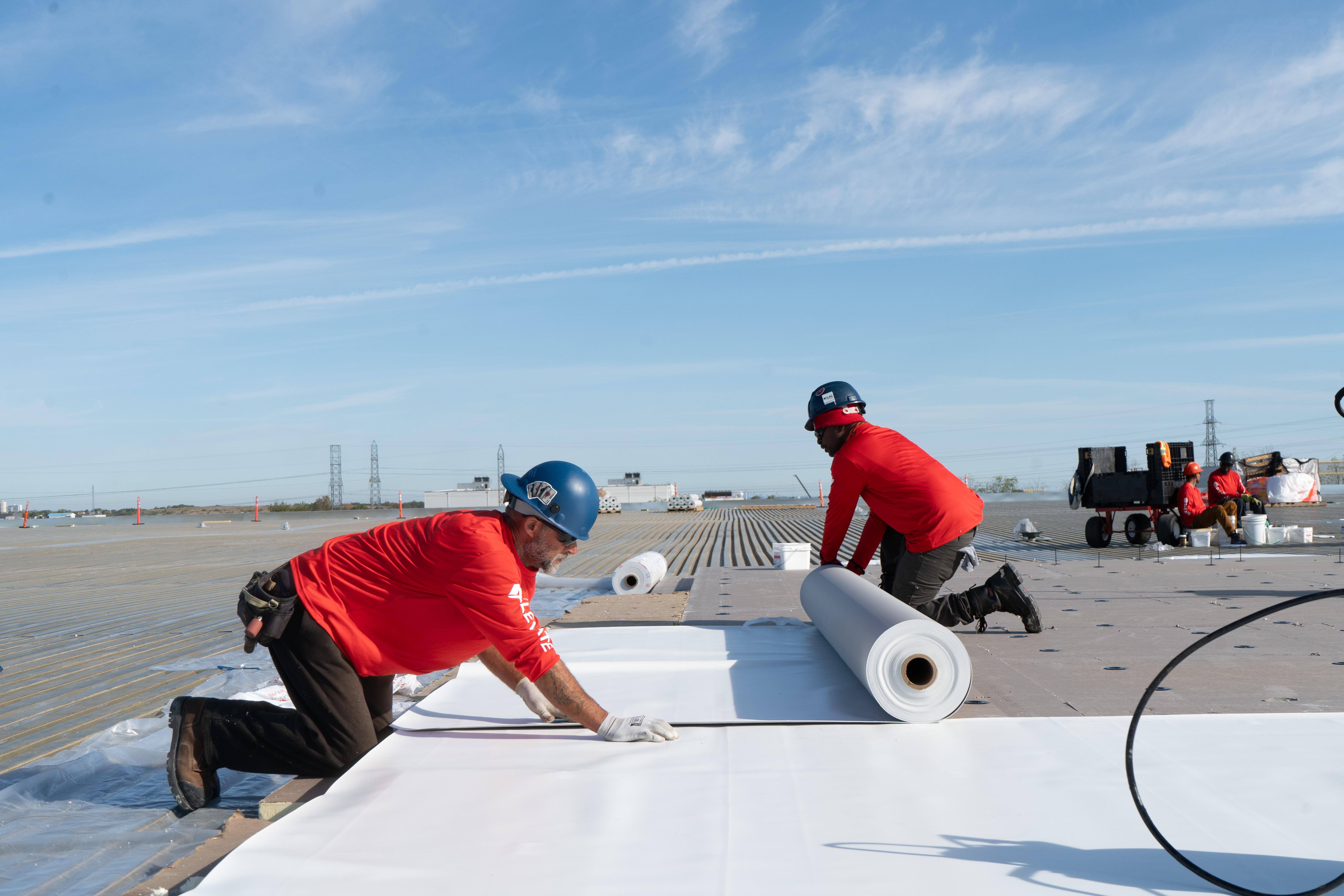 Elevate Commercial Building Products ChatGPT ad — Which Commercial Roof Is Right? in Garage Door Replacement & Repair Services
