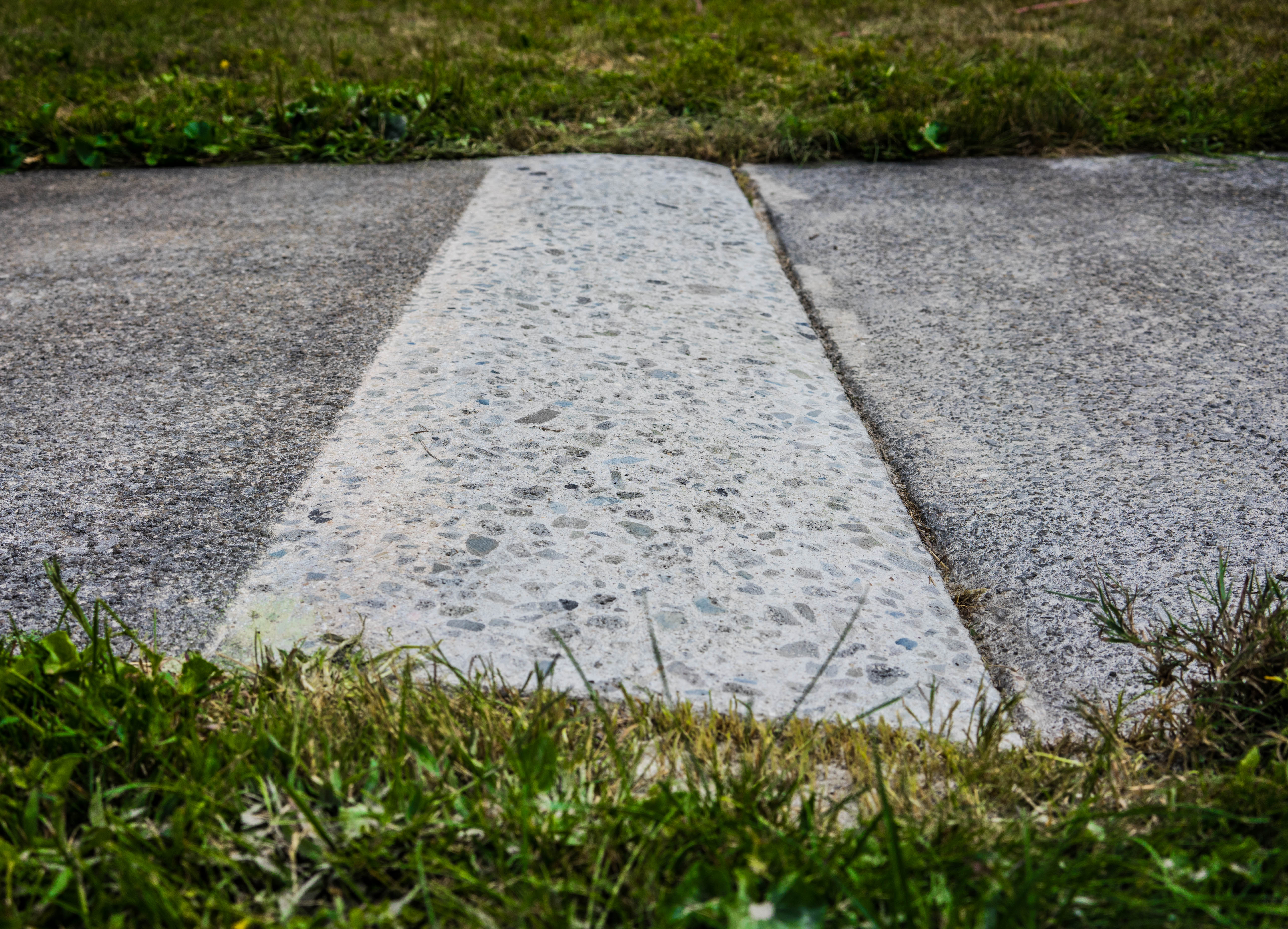 Universal Concrete Grinding, LLC ChatGPT ad — Sidewalk Trip Hazard Repair