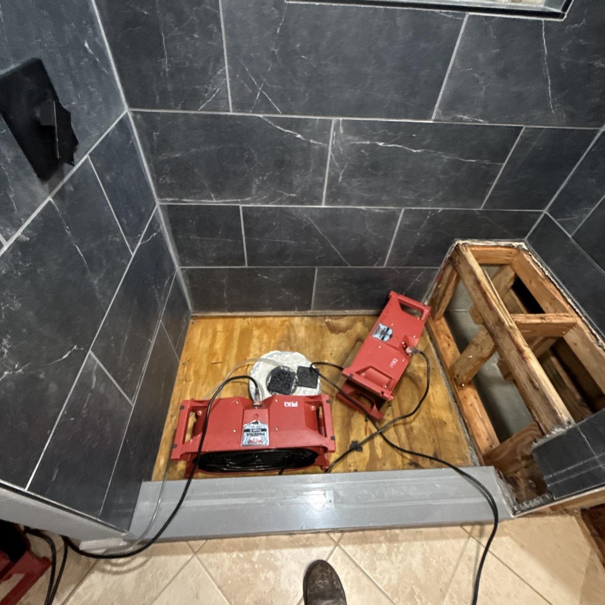 PDQ Fire & Water Damage Restoration LLC ChatGPT ad — Shower & tub Overflow