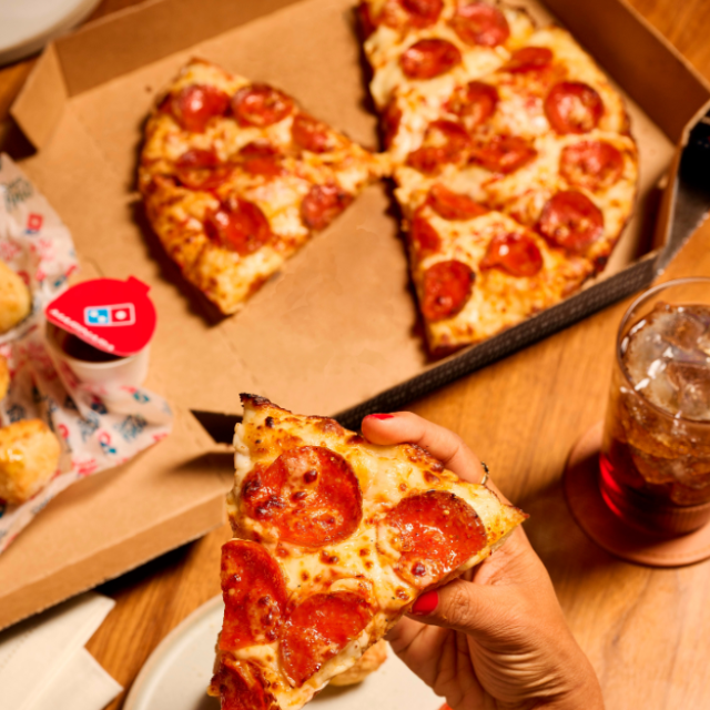 dominos.com ChatGPT ad — Domino's® Pizza in Indoor Trampoline Parks & Family Entertainment Centers