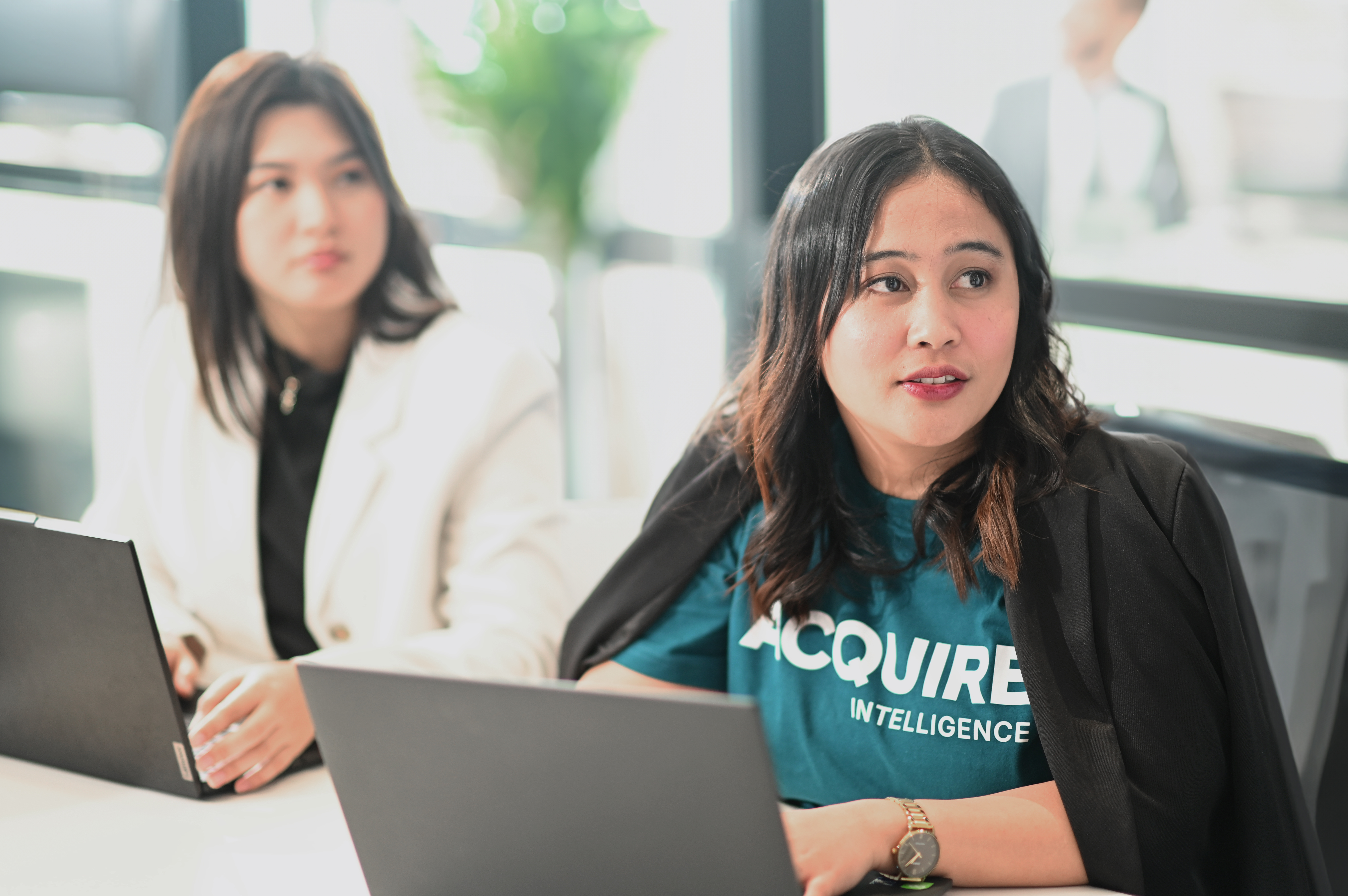 Acquire Intelligence ChatGPT ad — Cut Costs, Not Quality